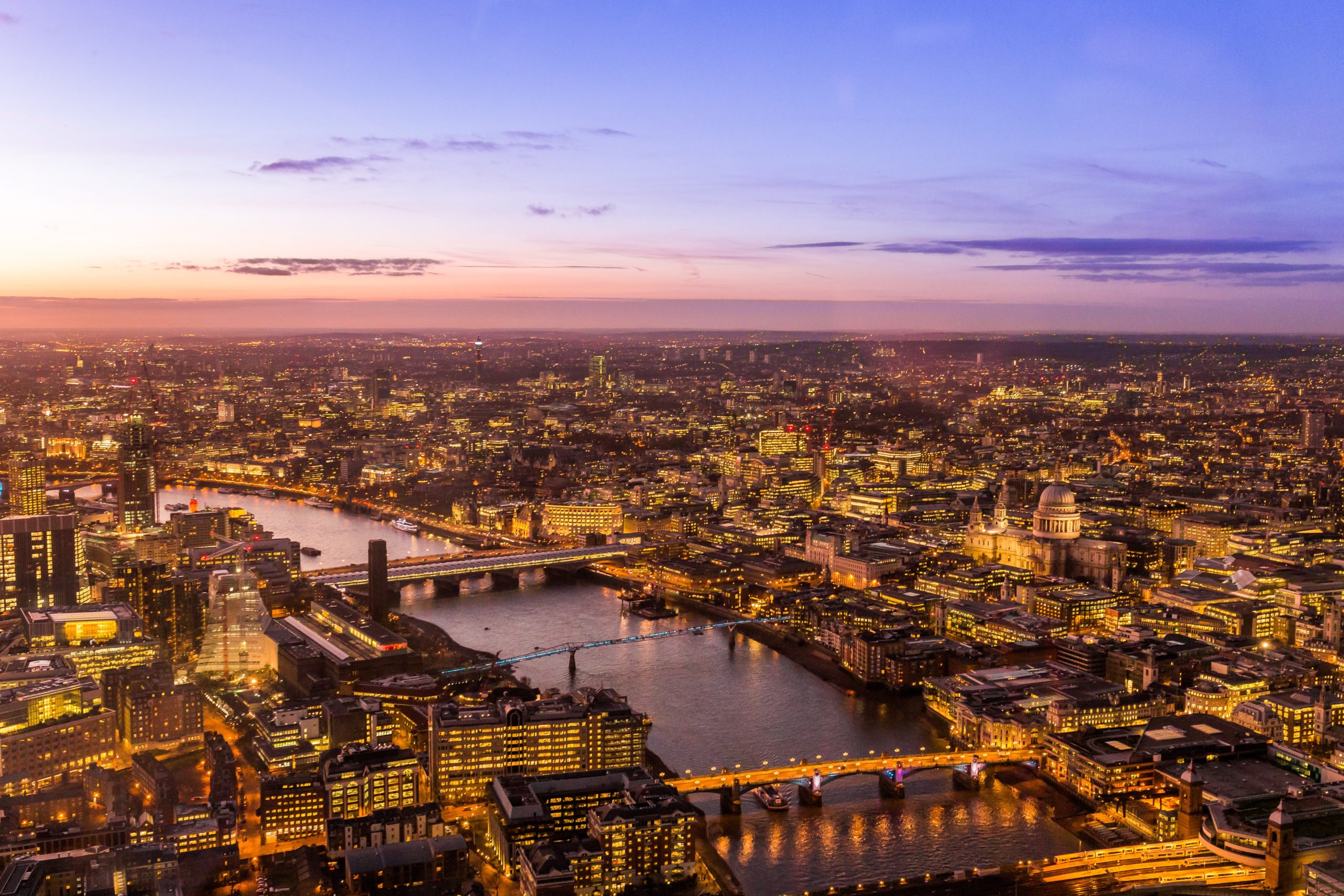 Overhead shot of London skyline with River Thames at sunset