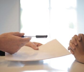 two people negotiating legal contract
