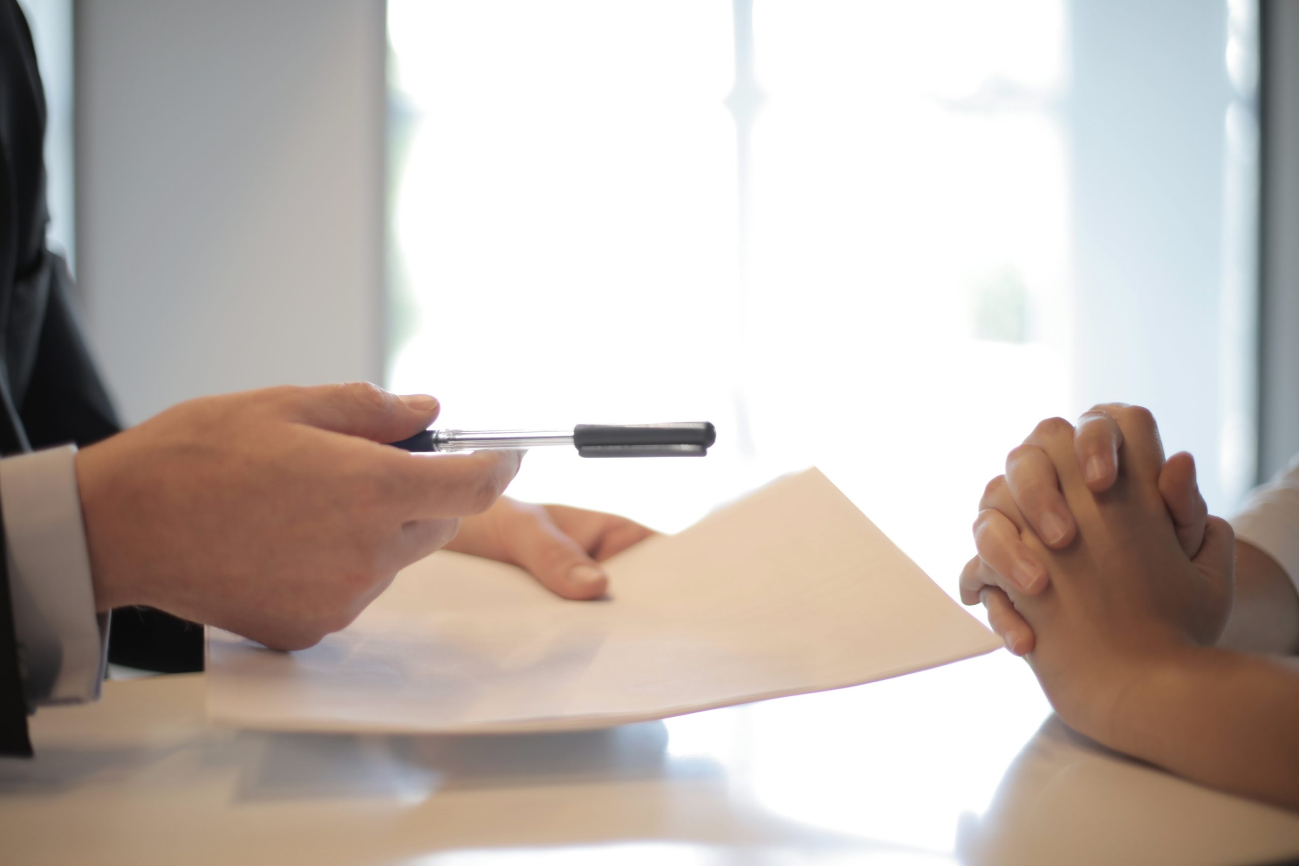 two people negotiating legal contract