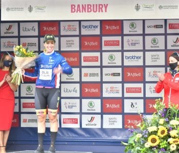 Marta Bastianelli presented with leaders jersey on stage by Heidi Yates from Spratt Endicott